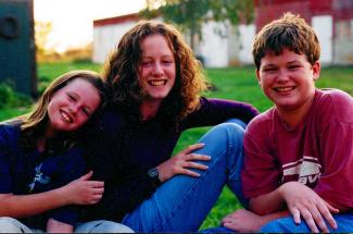 Morris, center, and her siblings Anna and Tyler grew up on a farm in Shelbyville, Kentucky. As kids, they were curious and adventurous. Photo provided.